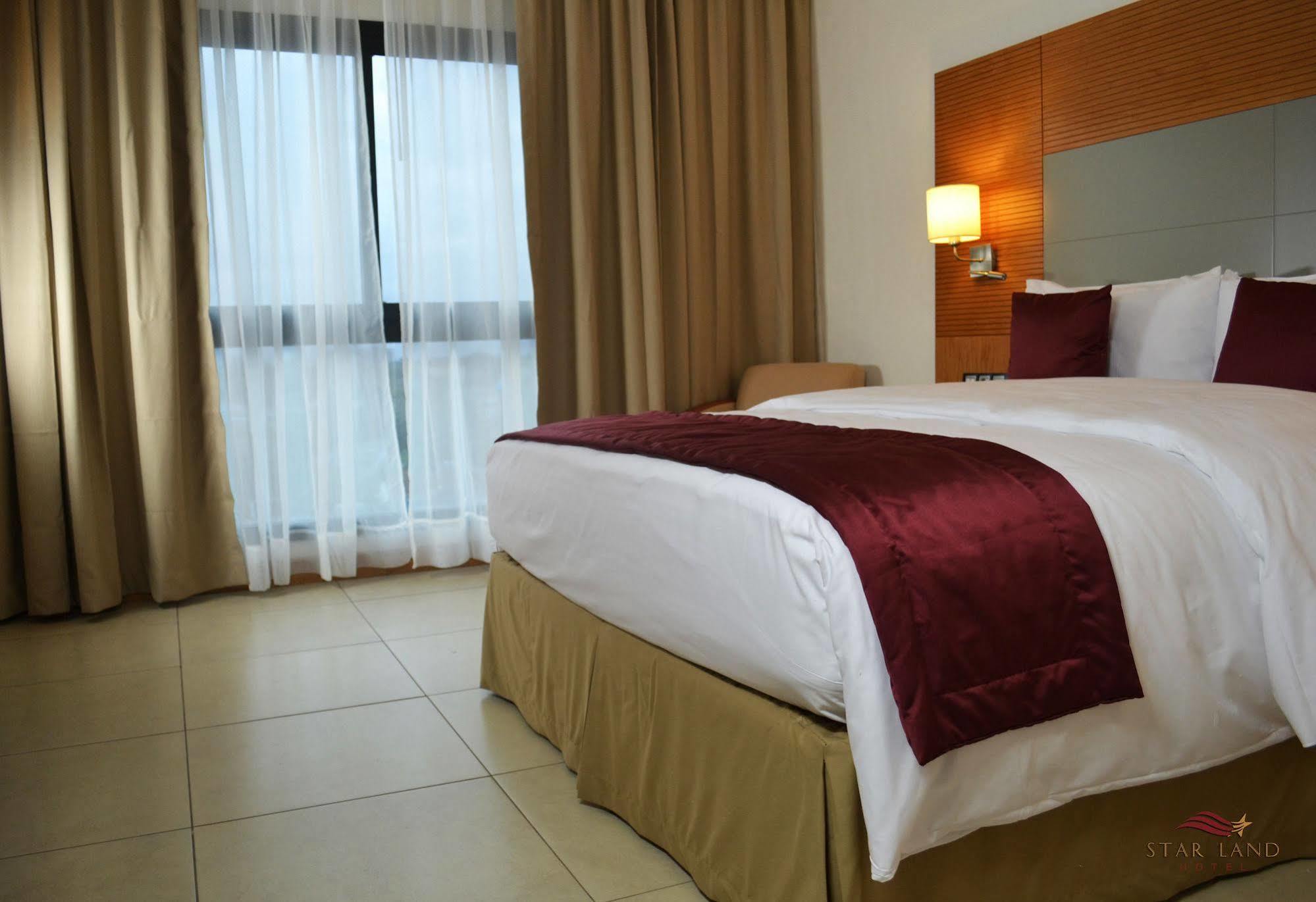 Star Land Hotel Bonapriso Douala Esterno foto